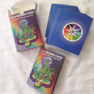 Cards with a rainbow dharma wheel on back and Tara on front